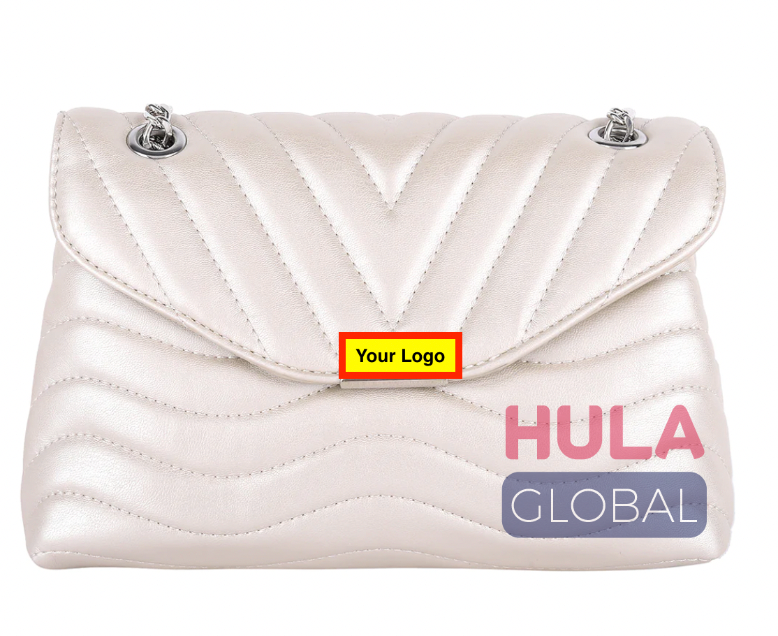 Supplier of Sling bags in leather and artificial leather
