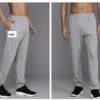 grey men's track pants